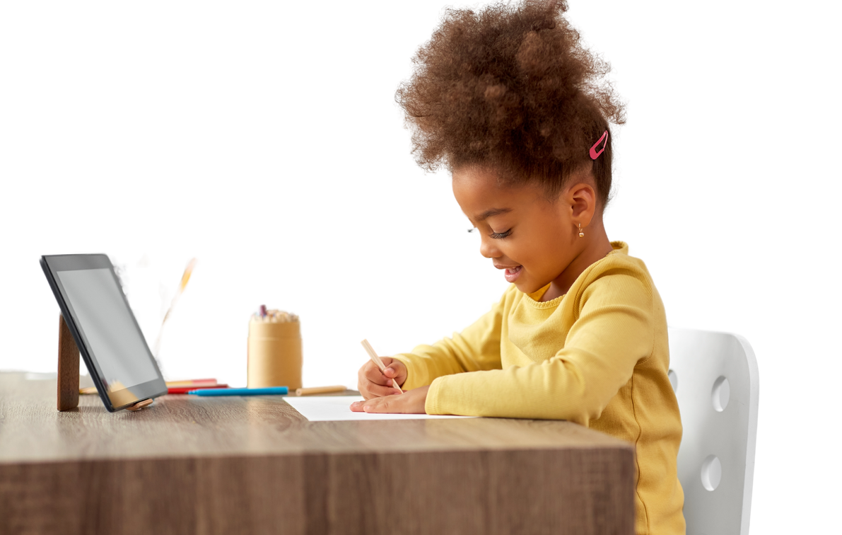 Little Girl Drawing with Pencils at Home